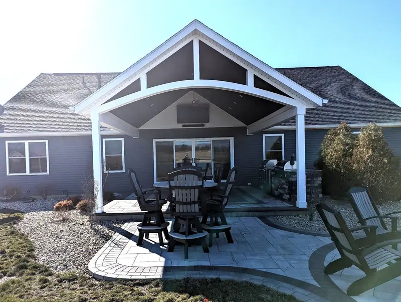 Gabled covered patio addition on the back of a home
